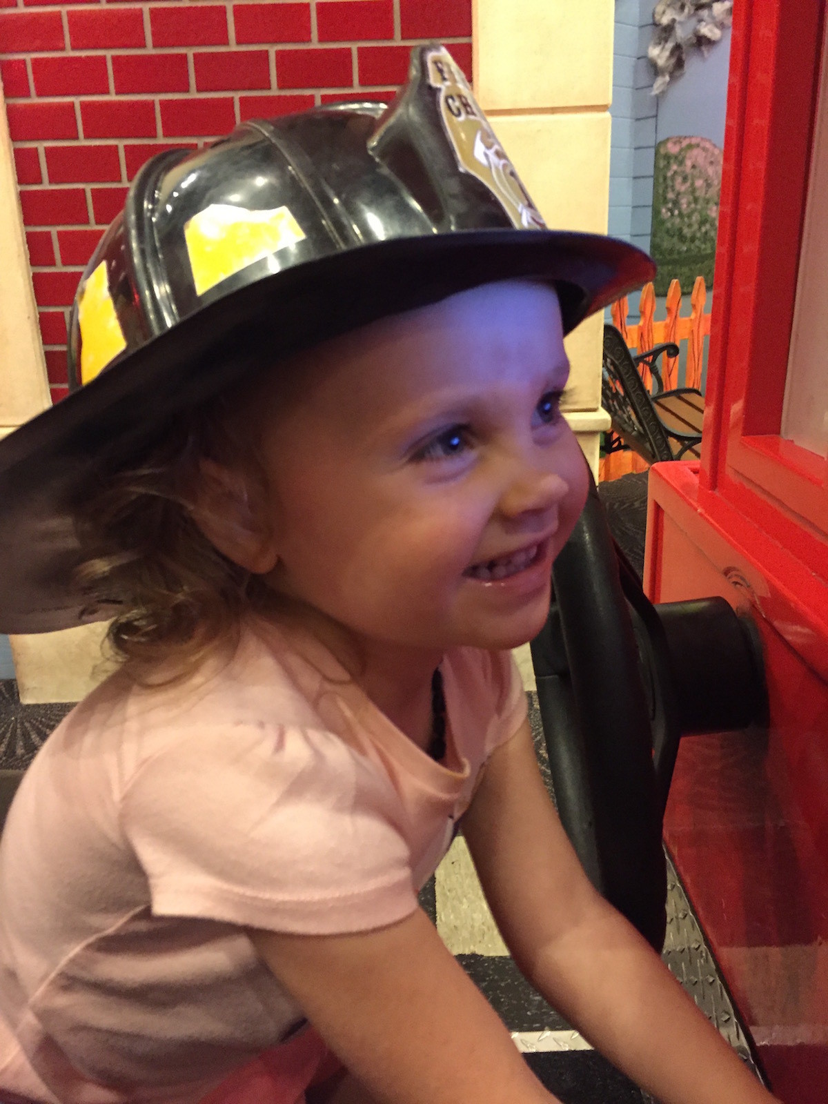 Ellie’s love for Great Explorations (and its fire truck)